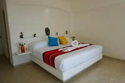 Cama o camas de una habitación en Mexican Condo by the sea