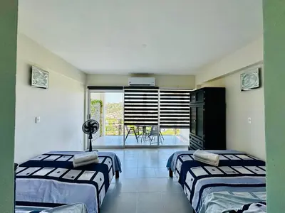 Cama o camas de una habitación en Departamento La mejor vista de Acapulco en CasaBlanca Grand