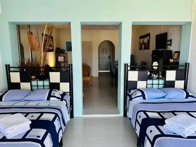 Cama o camas de una habitación en Departamento La mejor vista de Acapulco en CasaBlanca Grand