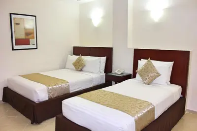 Cama o camas de una habitación en Best Western Taxco