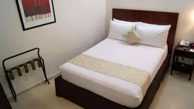 Cama o camas de una habitación en Best Western Taxco