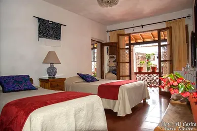 Cama o camas de una habitación en Hotel Mi Casita