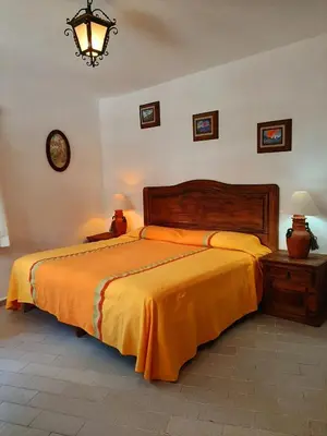 Cama o camas de una habitación en Hotel Posada San Javier
