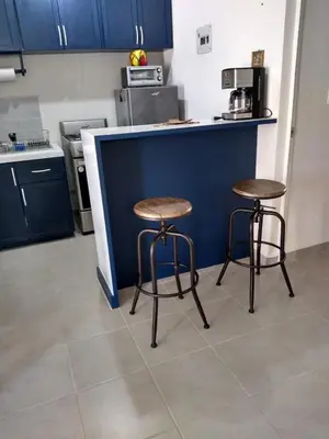 Una cocina o zona de cocina en El Arrecife: Apartamento con alberca a 10 minutos de la playa