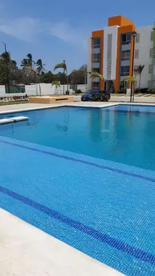 Piscina en o cerca de El Arrecife: Apartamento con alberca a 10 minutos de la playa