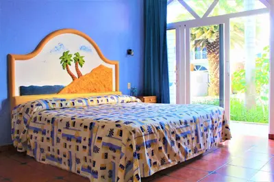 Cama o camas de una habitación en Hotel Mexico Lindo