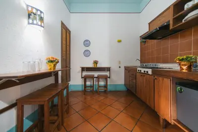 Una cocina o zona de cocina en Hotel Suites Del Centro
