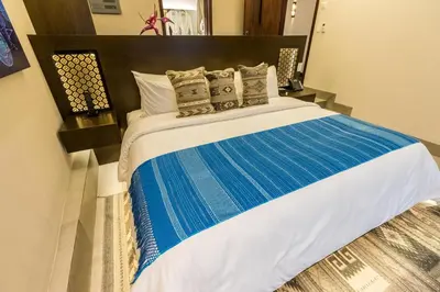 Cama o camas de una habitación en Casa Naila Hotel Boutique