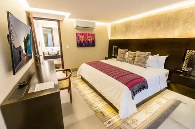 Cama o camas de una habitación en Casa Naila Hotel Boutique