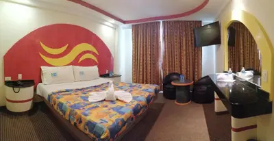 Cama o camas de una habitación en Hotel Atlántico