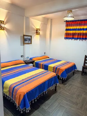 Cama o camas de una habitación en Hotel Yubazuu