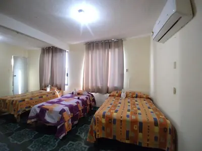 Cama o camas de una habitación en Hotel Puerto Real-Minatitlán