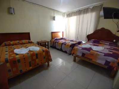 Cama o camas de una habitación en Hotel Puerto Real-Minatitlán