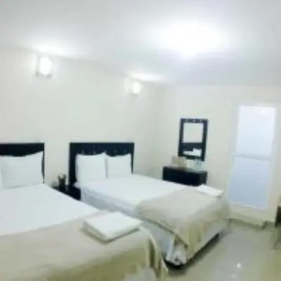 Cama o camas de una habitación en Hotel Puerto Real-Minatitlán