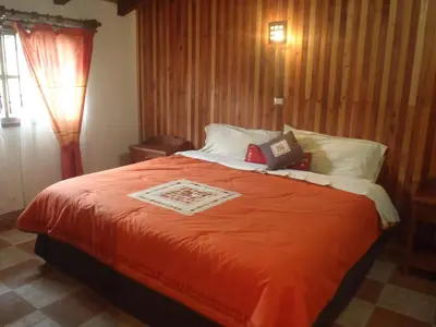 Cama o camas de una habitación en Cabañas Sierra Verde