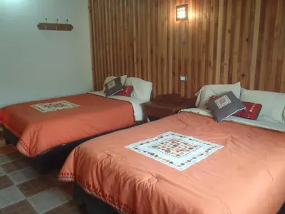 Cama o camas de una habitación en Cabañas Sierra Verde