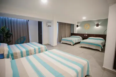 Cama o camas de una habitación en Hotel Camino Del Sol