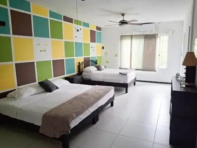 Cama o camas de una habitación en Villas Montserrat Wellness Center