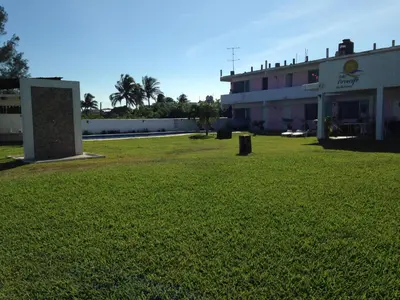 Jardín al aire libre en Hotel Arrecife Chachalacas