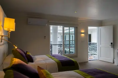 Cama o camas de una habitación en Casa Hidalgo Hotel Boutique