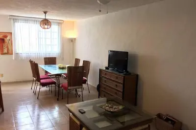 Una televisión o centro de entretenimiento en Depa Frente al Mar en Acapulco Diamante