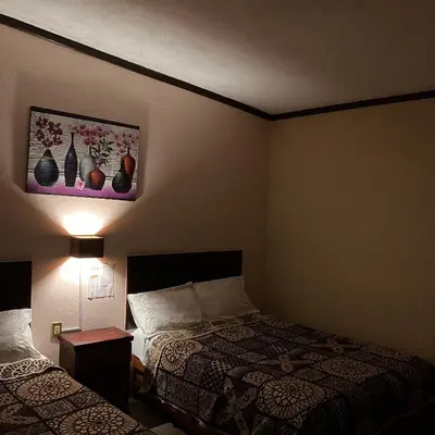 Cama o camas de una habitación en Hotel Santa Fe