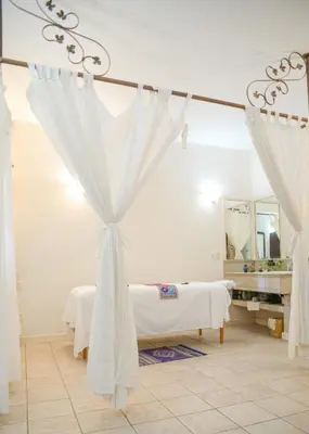 Cama o camas de una habitación en Hotel Hacienda Los Laureles