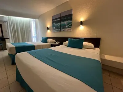 Cama o camas de una habitación en Howard Johnson by Wyndham Veracruz