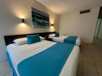 Cama o camas de una habitación en Howard Johnson by Wyndham Veracruz
