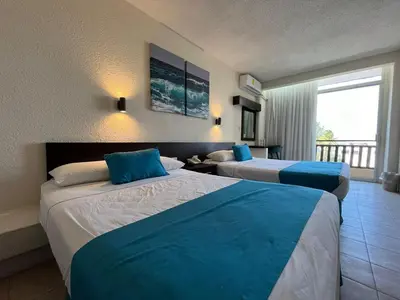Cama o camas de una habitación en Howard Johnson by Wyndham Veracruz