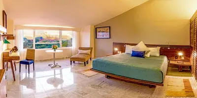 Cama o camas de una habitación en Las Brisas Huatulco-All Inclusive