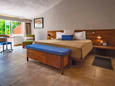 Cama o camas de una habitación en Las Brisas Huatulco-All Inclusive