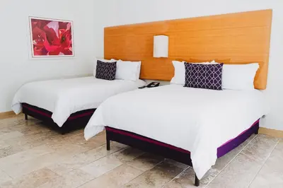Cama o camas de una habitación en Camino Real Zaashila Huatulco