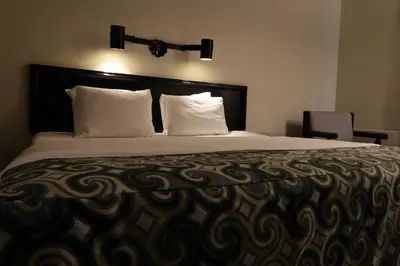 Cama o camas de una habitación en Aristos Puebla