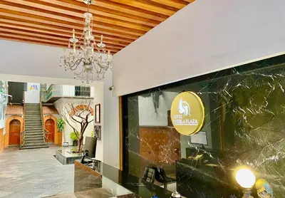 Certificado, premio, señal o documento que está expuesto en Hotel Puebla Plaza