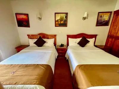Cama o camas de una habitación en Hotel Puebla Plaza