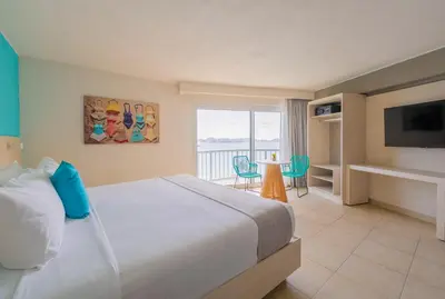 Cama o camas de una habitación en Hotel Amares Acapulco
