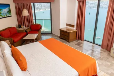 Cama o camas de una habitación en Copacabana Beach Hotel Acapulco