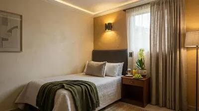 Cama o camas de una habitación en Hotel Express Quinta Soledad