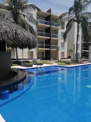 Piscina en o cerca de Departamento en condominio Diamante Turquesa