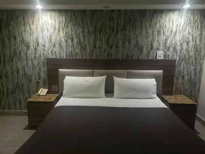 Cama o camas de una habitación en Motel Nuevo Tijuana