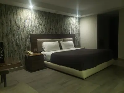 Cama o camas de una habitación en Motel Nuevo Tijuana