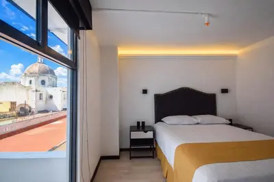 Cama o camas de una habitación en Hotel Tamara