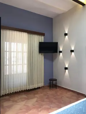 Una televisión o centro de entretenimiento en Casa de la Asunción