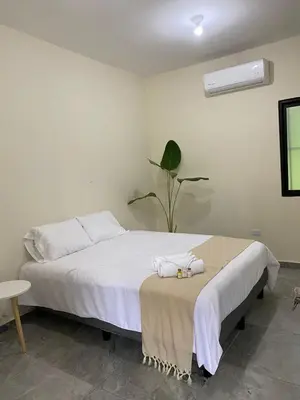 Cama o camas de una habitación en Hotel La Isla