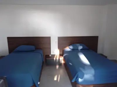 Cama o camas de una habitación en La Villa de Almudena
