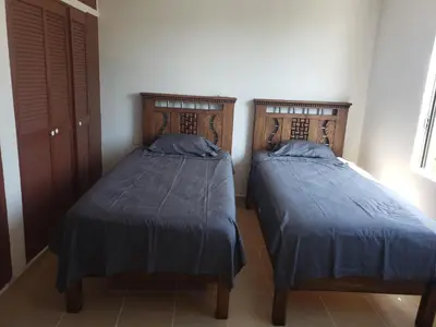 Cama o camas de una habitación en ACAPULCO DIAMANTE NUEVA E INCREIBLE VILLA CON ALBERCA PROPIA