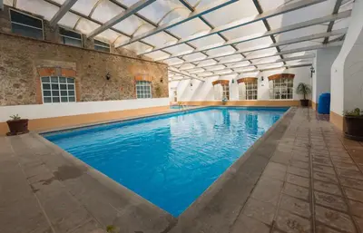 Piscina en o cerca de Hacienda Soltepec Suites Campo de Golf