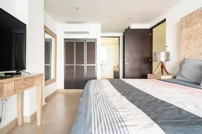 Cama o camas de una habitación en Bello Departamento Veleros frente al mar