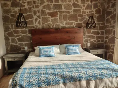 Cama o camas de una habitación en Hotel Casa Xaa